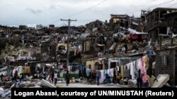 FILE - Clean up from Hurricane Matthew continues in Jeremie, Haiti, Oct. 6, 2016.