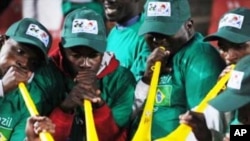 South African fans blow vuvuzelas in support of Brazil at last year's Confederations Cup in South Africa. .Football fans around the world want the instruments banned at the forthcoming World Cup