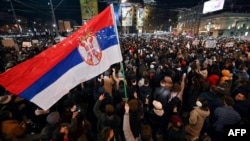 Thousands of students and citizens attend a protest over the collapse of a train station roof that killed 15 people last month, amid a widespread blockade of higher education institutions in downtown Belgrade, Serbia, Dec. 22, 2024. 