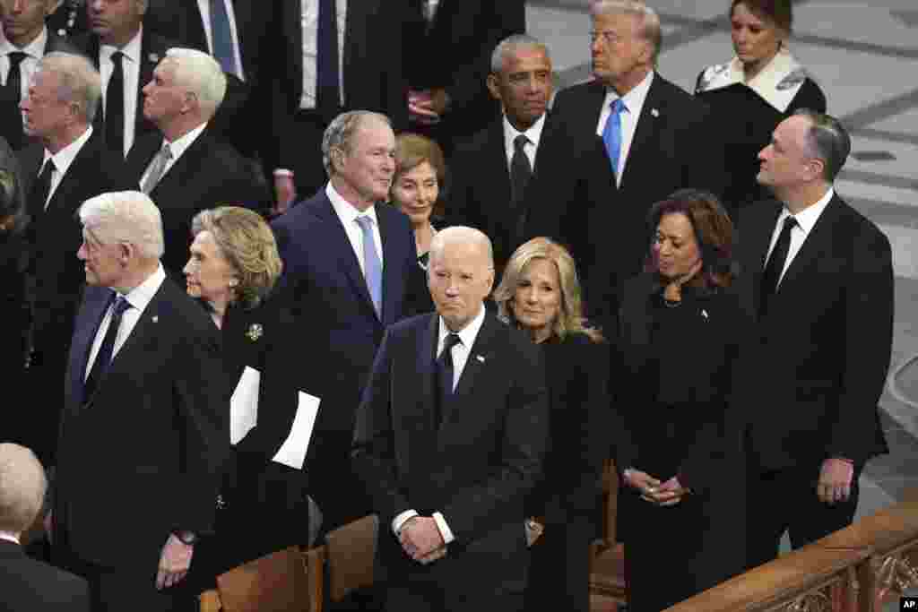 President Joe Biden and first lady Jill Biden watch as the state funeral for former President Jimmy Carter begins at Washington National Cathedral, Jan. 9, 2025.