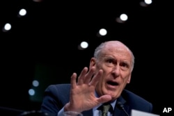 Director of National Intelligence Dan Coats speaks at a Senate panel hearing on worldwide threats, in Washington, Feb 13, 2018.