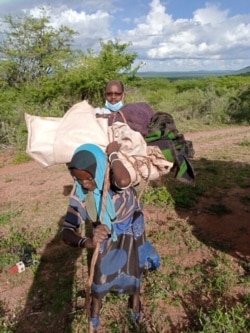 Families have been displaced from Wachile, Southern Oromia region of Ethiopia, May 5, 2020. The country is trying to avoid a food crisis caused by a huge invasion of locusts.