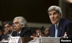 U.S. Secretary of State John Kerry, right, Energy Secretary Ernest Moniz, center, and Treasury Secretary Jack Lew testify before a Senate Foreign Relations Committee hearing, in Washington, July 23, 2015.