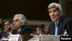 U.S. Secretary of State John Kerry, right, Energy Secretary Ernest Moniz, center, and Treasury Secretary Jack Lew testify before a Senate Foreign Relations Committee hearing, in Washington, July 23, 2015. 