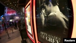 A film poster for "Fifty Shades of Grey" is pictured at Regal Theater in Los Angeles, California, Feb. 12, 2015. 
