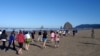 Cannon Beach's landmark Haystack Rock provided a backdrop for the tsunami prep fun run. VOA / T. Banse