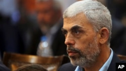 FILE - Hamas leader Yehiyeh Sinwar in Gaza attends a news conference in Gaza City. 