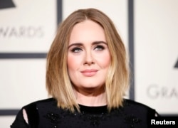Singer Adele arrives at the 58th Grammy Awards in Los Angeles, California, Feb. 15, 2016.