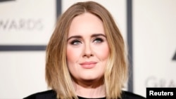Singer Adele arrives at the 58th Grammy Awards in Los Angeles, California, Feb. 15, 2016. 