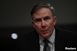 FILE - Assistant Secretary of Defense For Sustainment Robert McMahon testifies before Senate Armed Services subcommittee on the Military Housing Privatization Initiative in Washington, Feb. 13, 2019.