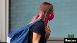 Belarusian sprinter Krystsina Tsimanouskaya arrives at the Polish embassy in Tokyo, Japan, Aug. 2, 2021.