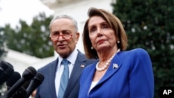 House Speaker Nancy Pelosi speaks with reporters alongside Senate Minority Leader Chuck Schumer outside of the West Wing of the White House after a meeting with President Donald Trump, Oct. 16, 2019, in Washington.
