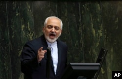 FILE - Iranian Foreign Minister Mohammad Javad Zarif addresses an open session of parliament in Tehran, July 21, 2015.