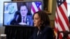 Wakil Presiden Kamala Harris mencatat saat berdiskusi soal penanganan imigran melalui konferensi video dengan Presiden Guatemala Alejandro Giammattei, dari Gedung Putih, Washington, 26 April 2021. (Foto: Evelyn Hockstein/Reuters)