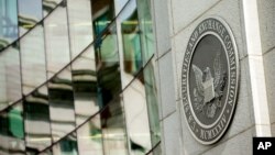 FILE - The U.S. Securities and Exchange Commission building in Washington.