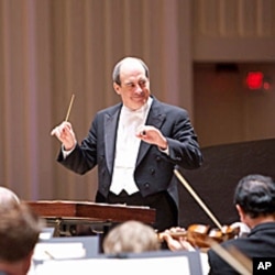 Robert Spano conducts the world premiere of Christoper Theofanides' 'Une Certaine Joie de Vivre' at the Atlanta Symphony's season opening night concert in September 2010.