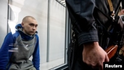 وادیم شیشیمارین، ۲۱ ساله، در دادگاهی در کی‌یف