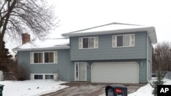 The home of Papa Faal in Brooklyn Center, Minn. Faal, 46, is one of two men in federal custody that prosecutors charged Monday with conspiring to help overthrow the government in the tiny West African nation of Gambia, Jan. 5, 2015. 
