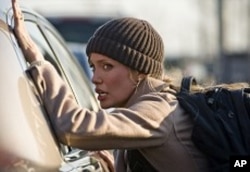 Angelina Jolie stars as "Evelyn Salt" in Columbia Pictures' contemporary action thriller SALT.