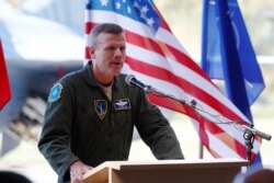 FILE - U.S. Air Forces in Europe Commander Tod D. Wolters speaks during NATO Baltic ceremony in Siauliai, Lithuania, Aug. 30, 2017.