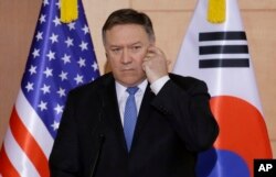 U.S. Secretary of State Mike Pompeo listens to a question during a joint press conference with South Korean Foreign Minister Kang Kyung-wha and Japanese Foreign Minister Taro Kono following their meeting at Foreign Ministry in Seoul, South Korea, June 14, 2018.