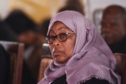 FILE - Tanzania's new President Samia Suluhu Hassan attends the farewell mass for the late Tanzanian President John Magufuli before the burial at Magufuli Stadium in Chato, Tanzania, March 26, 2021.