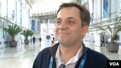 Mikail Demin, Olympic Press Center, Olympic Village, Sochi, Russia, Feb. 16, 2014. (Parke Brewer/VOA)