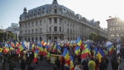 Demonstrators attend a rally against new restrictions imposed by the government after a surge in COVID-19 cases, in Bucharest, Oct. 2, 2021.(Inquam Photos/Octav Ganea via Reuters)