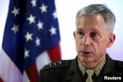 FILE - U.S. Marine Corps General Thomas Waldhauser holds a news conference at Camp Lemonnier in Ambouli, Djibouti, April 23, 2017.