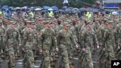 FILE - U.S. Army soldiers take part in a parade during the 75th South Korea Armed Forces Day ceremony in Seoul, South Korea, Sept. 26, 2023.