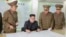 FILE - This image made from video of an Aug. 14, 2017, still image broadcast in a news bulletin, Aug. 15, 2017, by North Korea's KRT shows North Korean leader Kim Jong Un receiving a briefing in Pyongyang.