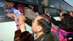 FILE - Tens of thousands of South Koreans have held reunions with their North Korean family members since the 1980s, as these people did at Diamond Mountain in North Korea, Feb. 25, 2014.
