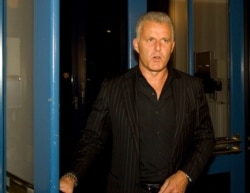 FILE - Dutch crime reporter Peter R. de Vries arrives for a live TV show in Amsterdam, Netherlands, Jan. 31, 2008.