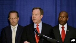 Michigan Attorney General Bill Schuette addresses the media, Wednesday, April 20, 2016 in Flint, Mich. 