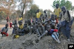 Kids play in the dirt at Doro refugee camp in South Sudan, December 2011.