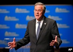 FILE - Republican presidential candidate Jeb Bush speaks during a Presidential candidate forum at Regent University in Virginia Beach, Va, Oct, 23, 2015.