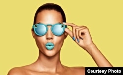 Snap Inc. has started selling its Spectacles sunglasses online in the United States. The glasses can record short video clips that can be shared with Snapchat users. (Snap Inc.)