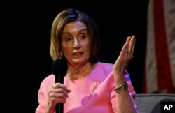 FILE - Speaker of the House Nancy Pelosi, D-Calif., gestures while addressing the Commonwealth Club in San Francisco, May 29, 2019.