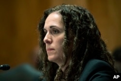 FILE - Director of the National Counterterrorism Center Christine Abizaid testifies before a Senate Homeland Security and Governmental Affairs Committee hearing to discuss security threats, Sept. 21, 2021 on Capitol Hill.