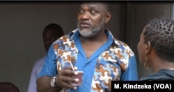A man drinks Cameroon coffee, April 17, 2019, at the annual coffee festival in Yaounde, Cameroon.