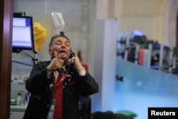 A trader works on the floor of the New York Stock Exchange in New York, Dec. 20, 2018.