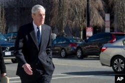 FILE - Special Counsel Robert Mueller walks to his car after attending services at St. John's Episcopal Church, across from the White House, in Washington, March 24, 2019.