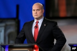 FILE - Then-Iowa Republican senatorial candidate and former U.S. Attorney Matt Whitaker is pictured before a televised debate in Johnston, Iowa, April 24, 2014.
