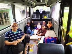 Van berukuran besar yang bisa memuat 12 kursi roda (foto: courtesy).