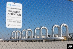 FILE - In this Nov. 3, 2015 photo, the Keystone Steele City pumping station, into which the planned Keystone XL pipeline is to connect in Steele City, Nebraska.