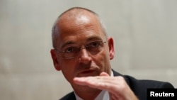 Fonterra Chief Executive Theo Spierlings talks to the media in Beijing, Aug. 5, 2013.