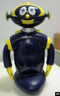 Cosmobot's creator, Dr. Corinna Lathan, says children can relate to as well as control, talk to and become friends with the interactive robot.