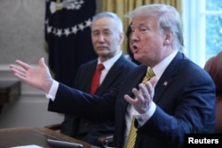 U.S. President Donald Trump speaks while meeting with China's Vice Premier Liu He in the Oval Office of the White House in Washington, April 4, 2019.