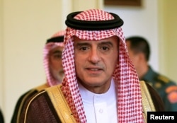 Saudi Arabia Foreign Minister Adel bin Ahmed Al-Jubeir arrives to meet Indonesia President Joko Widodo at presidential palace in Bogor, Indonesia, Oct. 22, 2018.