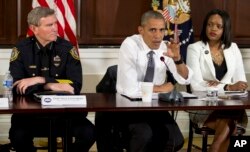 President Obama talks to reporters after a meeting at the Eisenhower Executive Office Building on the White House complex in Washington, July 13, 2016, about community policing and criminal justice.